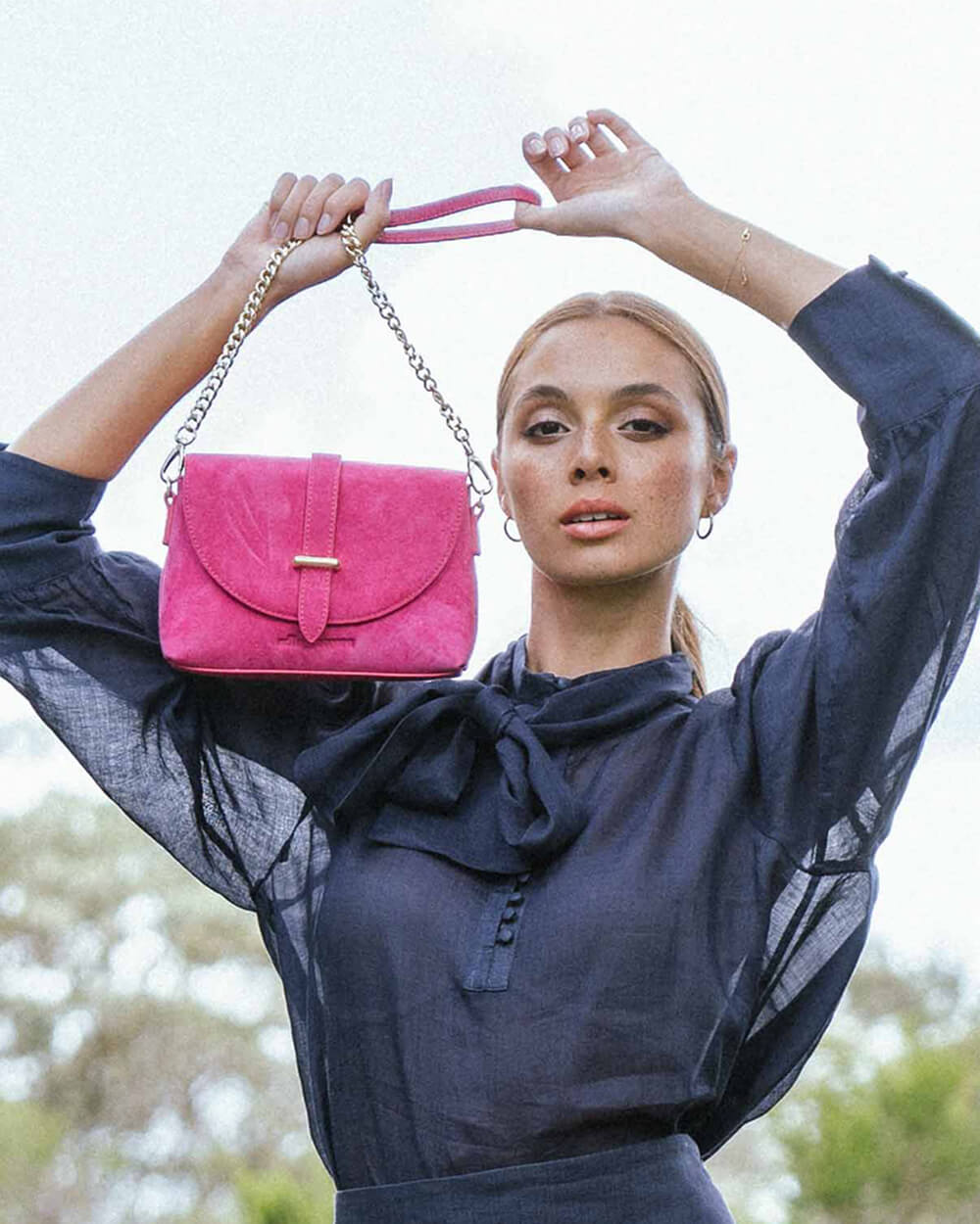 Hot pink 2025 suede bag