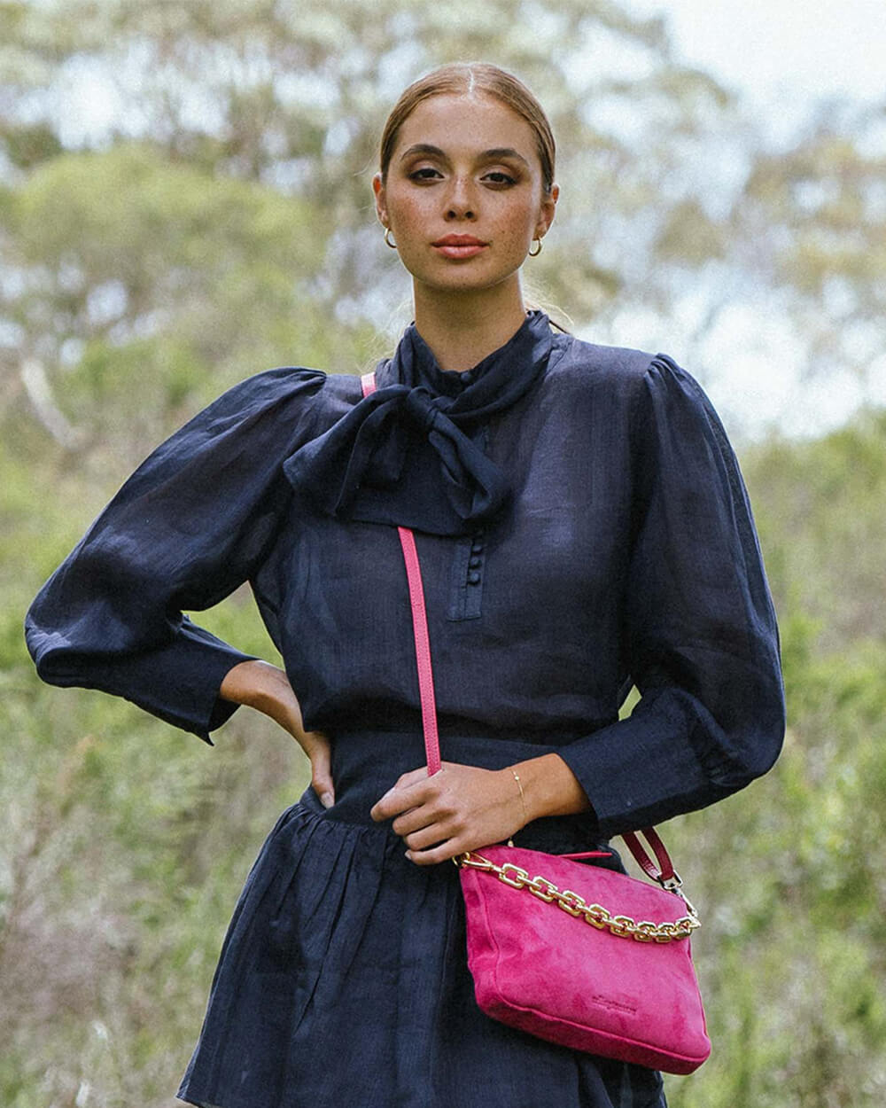 Hot pink suede clutch bag hot sale